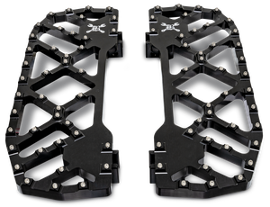 Par de plataformas traseras negras MX Evolution de la marca Burly instaladas en una motocicleta