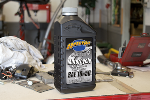 Frasco de aceite sintético Platinum Spectro Supreme SAE 10W50 para motos