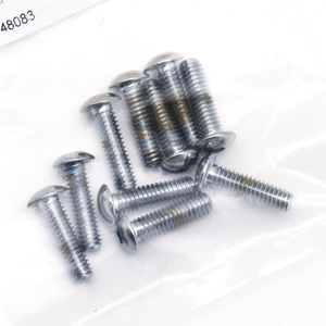 Vista cenital de un surtido de tornillos Allen con cabeza botón de acabado cromado brillante