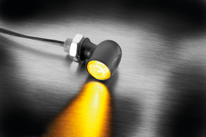 Mini luz LED Kellermann Spot negra montada en manillar de motocicleta