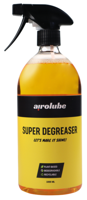 Botella de desengrasante AiroLube para mantenimiento de motocicletas