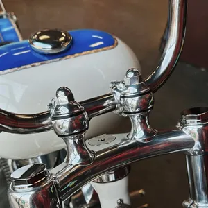 Indian Larry, elevadores Throwback. Elevación de 2". Aluminio pulido
