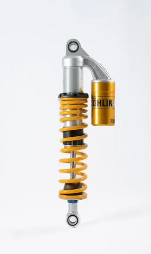 Amortiguador TTX Flow negro con cuerpo de aluminio pulido y ajuste de precarga