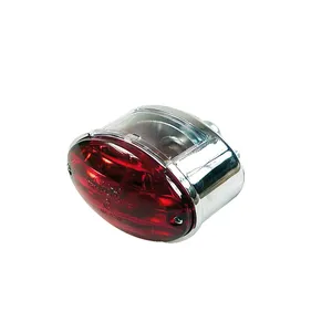 Luz trasera cateye mediana. Cromada